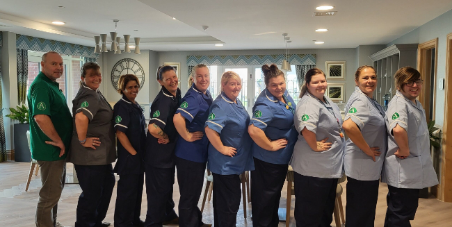 Staff at Alexander House in their uniforms