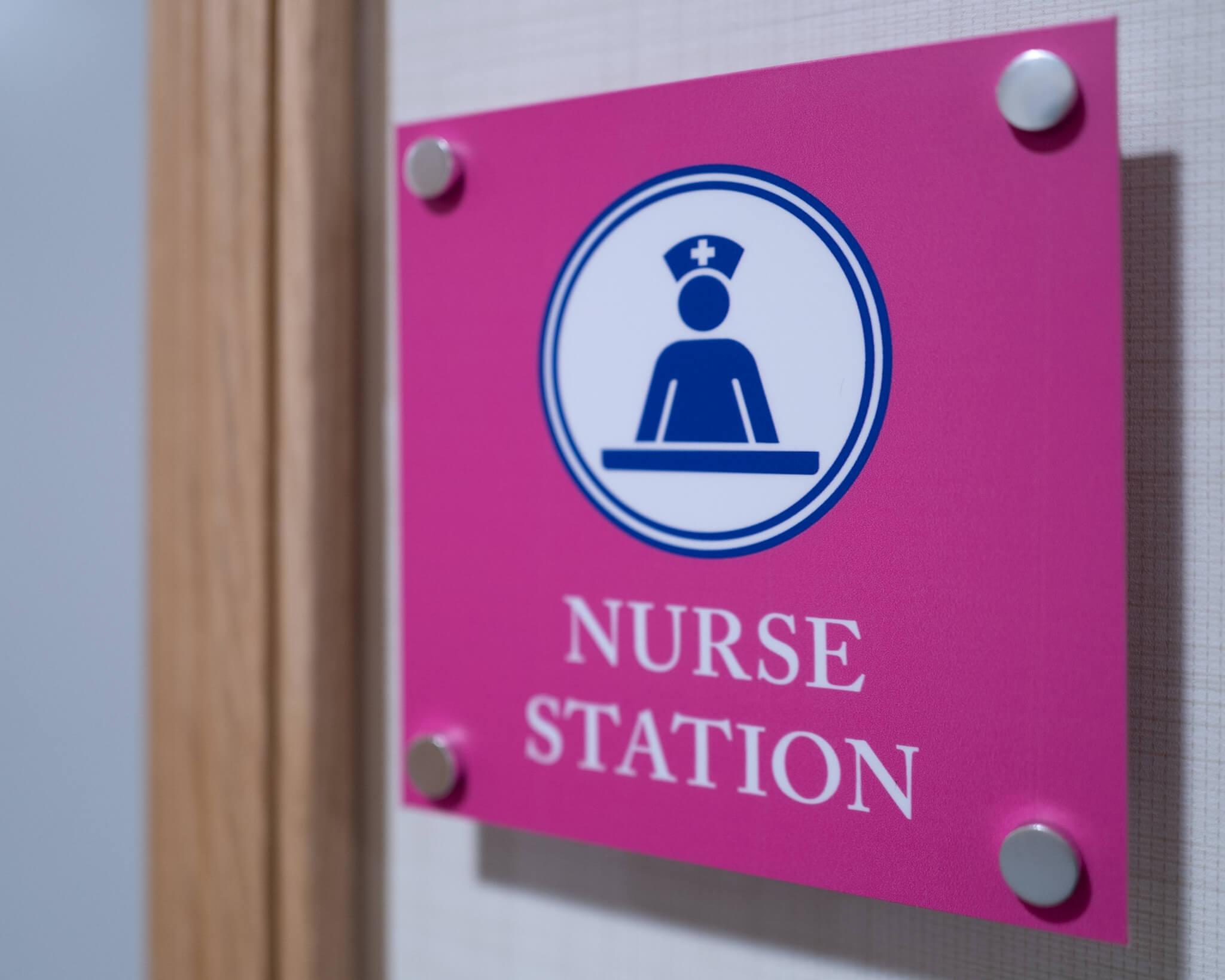 Pink sign "Nurse Station".