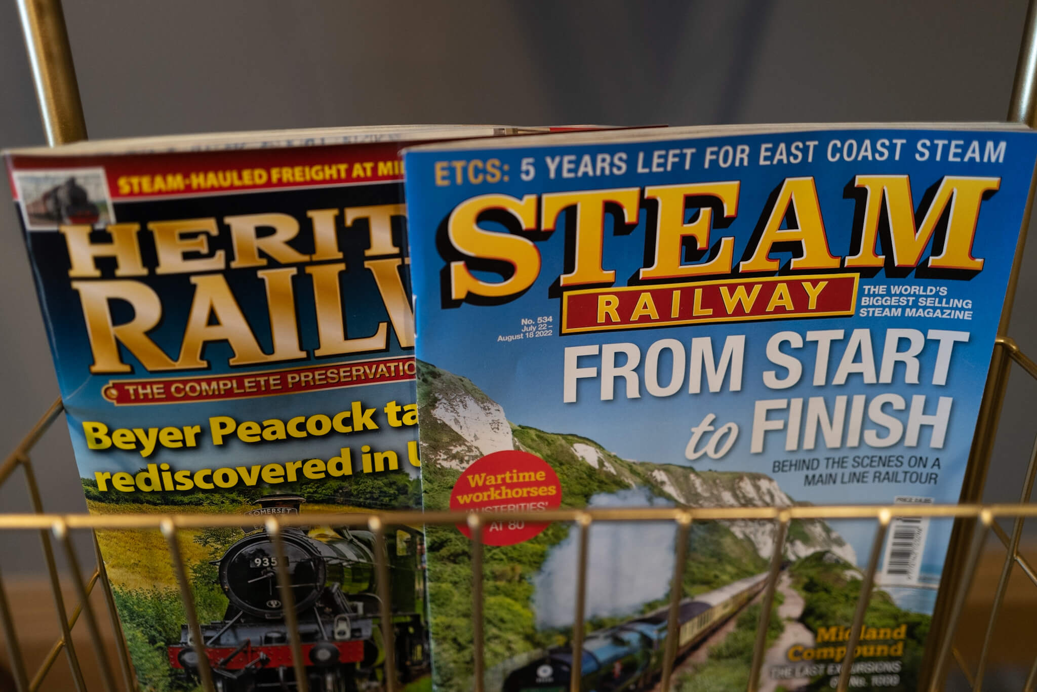Two magazine about trains.