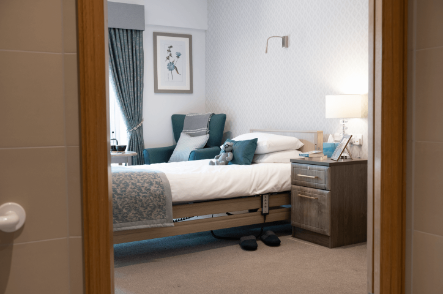 A bedroom with green decorations