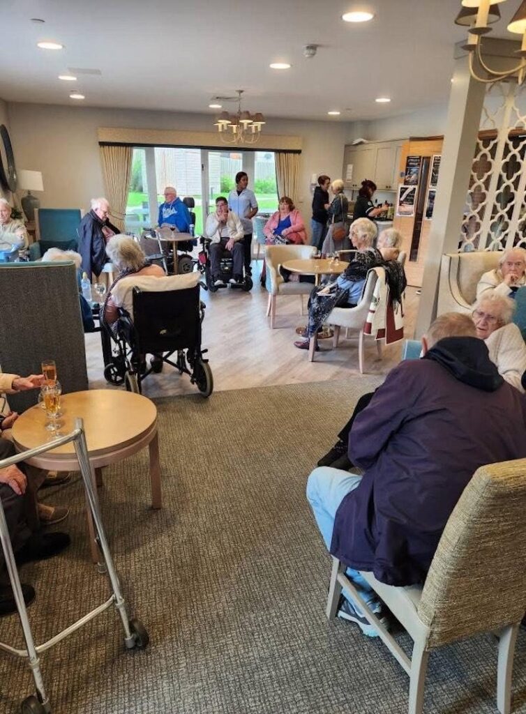 residents in our lounge celebrating VE day