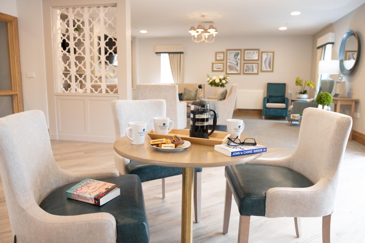 table and chairs in dining room with biscuits on the table