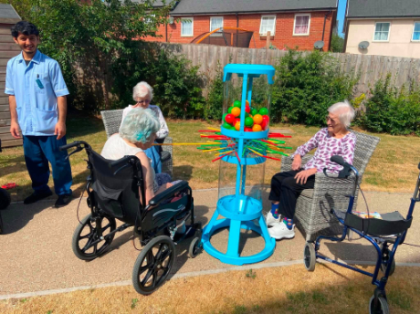 Arts and crafts activity taking place outdoors in the private garden